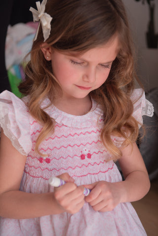 A pair of white hair clip